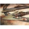 Image 2 : Two hand weapons & painted animal hide from the popular Sci-fi series