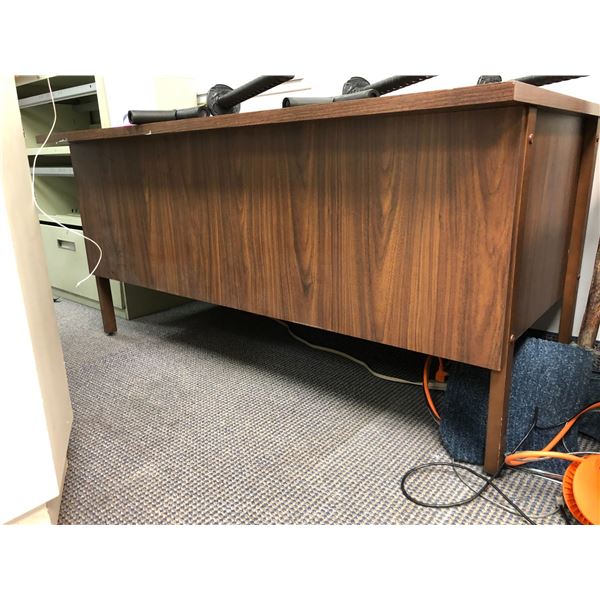 Wood laminate 6 drawer desk from the production offices from the show