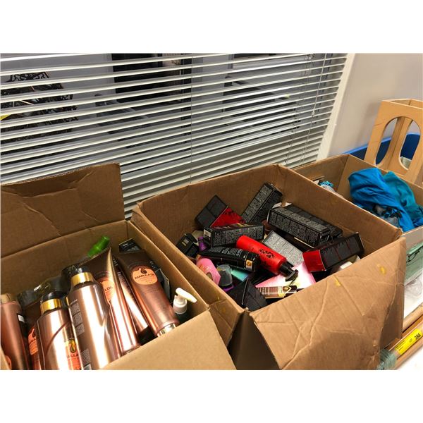4 boxes of suntan lotion/t-shirts/bikini shop props from popular sci-fi series