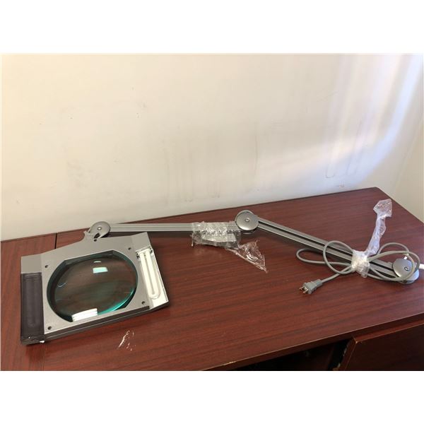 Adjustable swing arm magnifying lamp from the popular sci-fi series