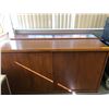 Image 1 : A pair of wooden book shelves with sliding front doors (each measures 64" across x 16" wide x 34" ta