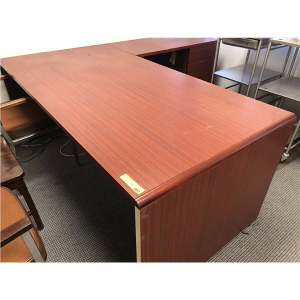 Cherrywood finish L shape 4 drawer office desk from the production office of the show