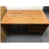 Image 1 : Small wooden desk and metal office cabinet from the production office of the show