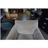 Image 2 : BEIGE UPHOLSTERED PILLOWBACK ARMCHAIR WITH WOOD BASE