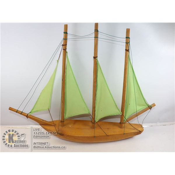 FOLK ART CARVED WOODEN BOAT, 19 X 16