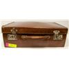 Image 1 : SMALL COWHIDE SUITCASE WITH VARIOUS COLLECTIBLES