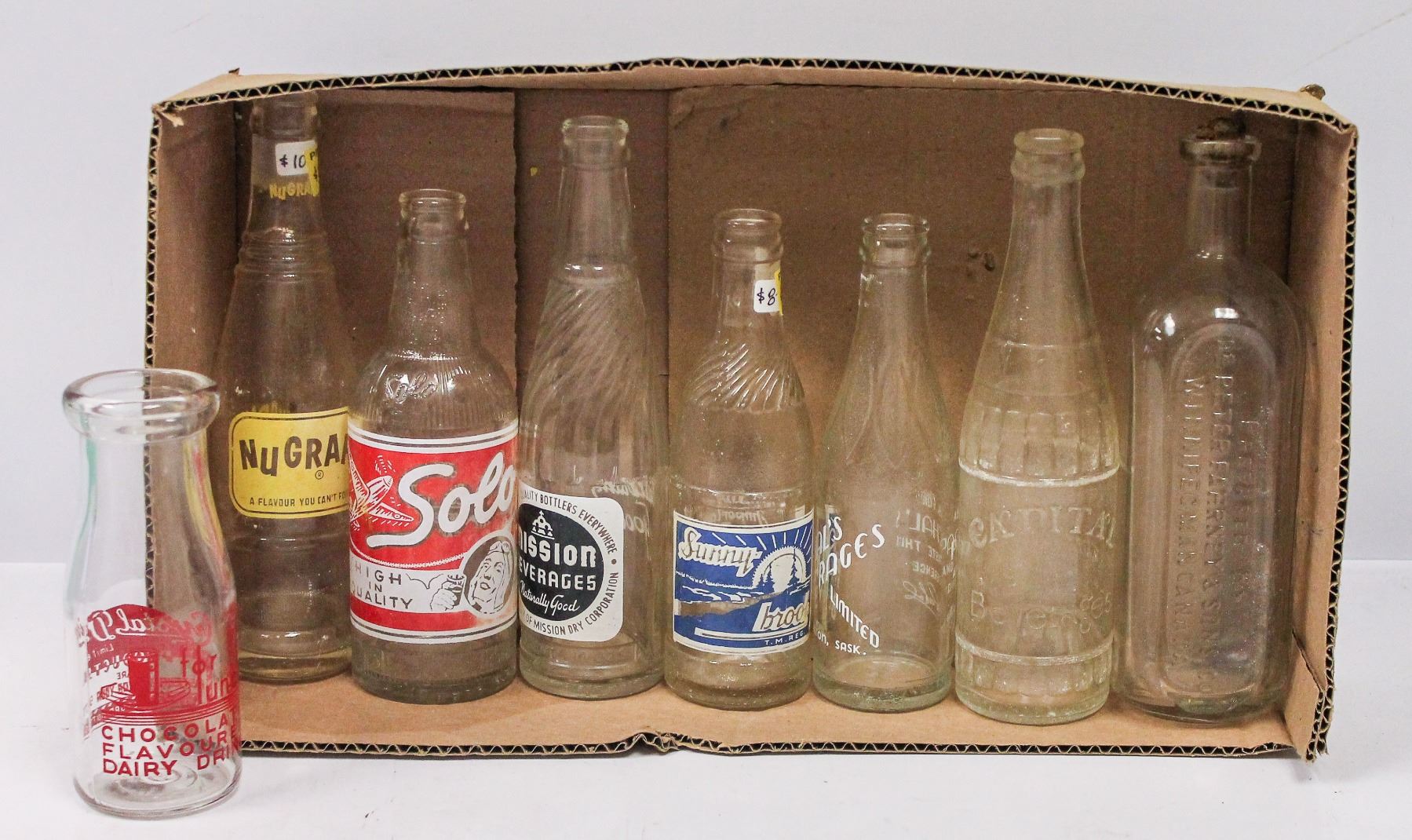 BOX OF ASSORTED RARE SODA BOTTLES