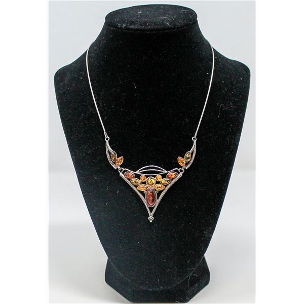 .925 SILVER MARKED AMBER PENDANT AND CHAIN,