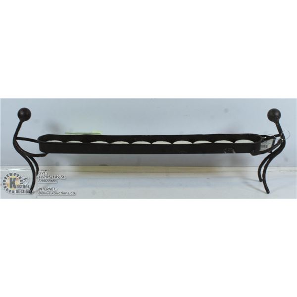 METAL CANDLE DISPLAY OF 2 MEN HOLDING BIN