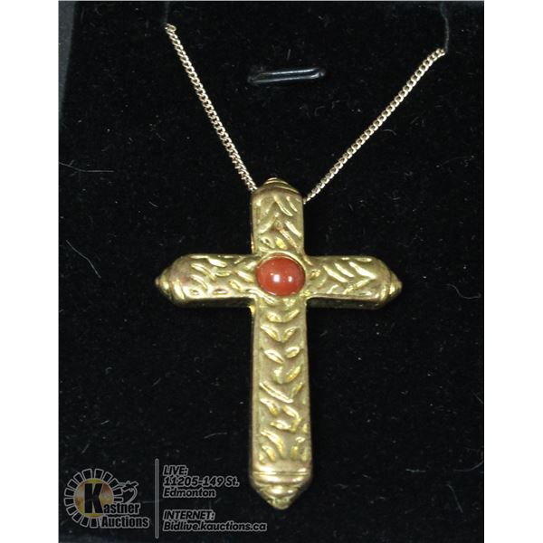 VINTAGE CROSS GOLD WITH A STONE IN THE MIDDLE AND