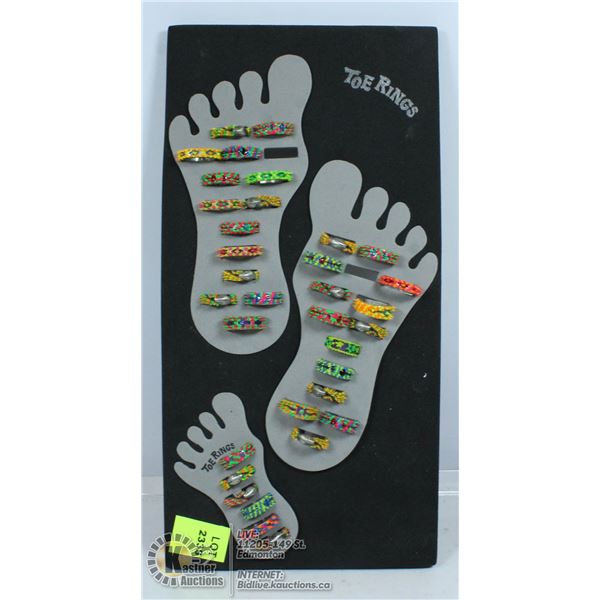 LOT OF TOE RINGS IN DISPLAY.