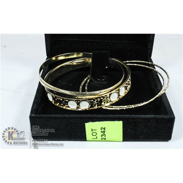 LOT OF BANGLE BRACELETS.