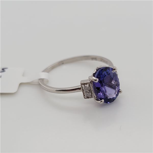 BZ337-23 PLATINUM TANZANITE  DIAMOND RING