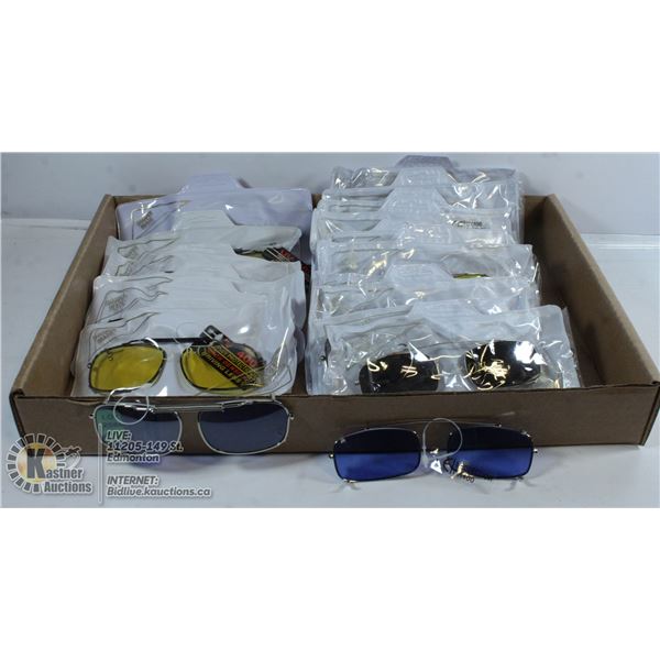 FLAT OF CLIP ON SUNGLASSES COVERS.