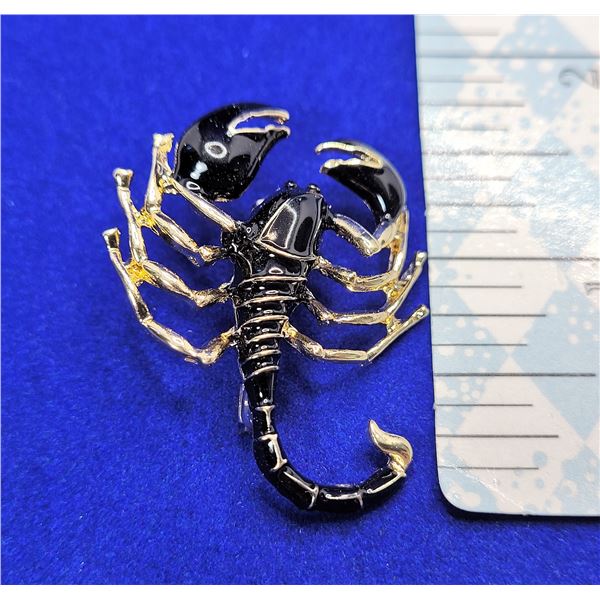 5)  GOLD TONE WITH BLACK ENAMEL