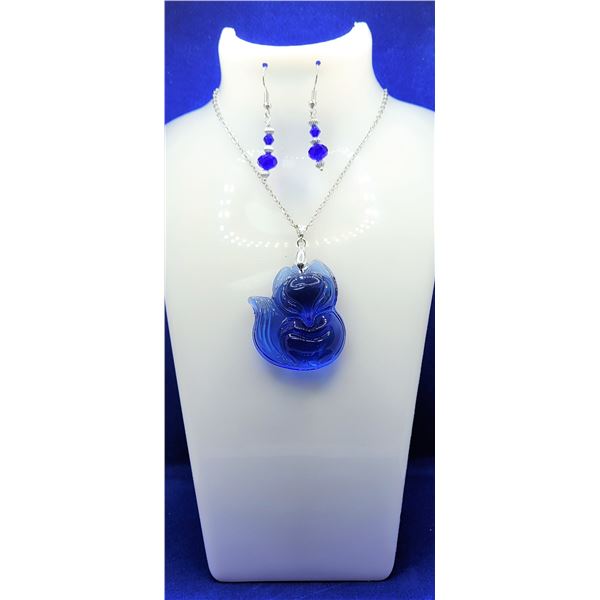 18)  TITANIUM CRYSTAL BLUE CARVED FOX