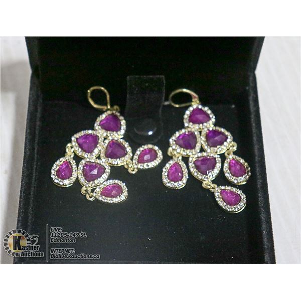 PAIR OF GOLD TONED EARRINGS WITH PURPLE RHINESTONE