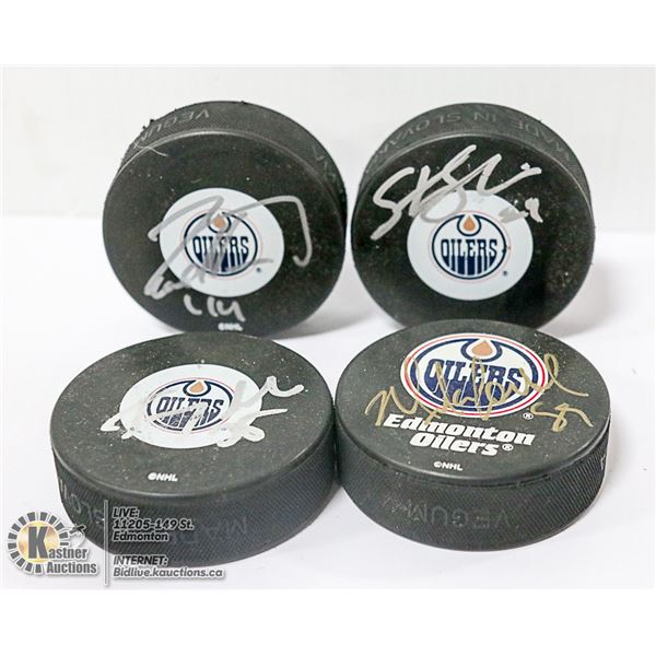 LOT OF 4 EDMONTON OILERS SIGNED HOCKEY PUCKS