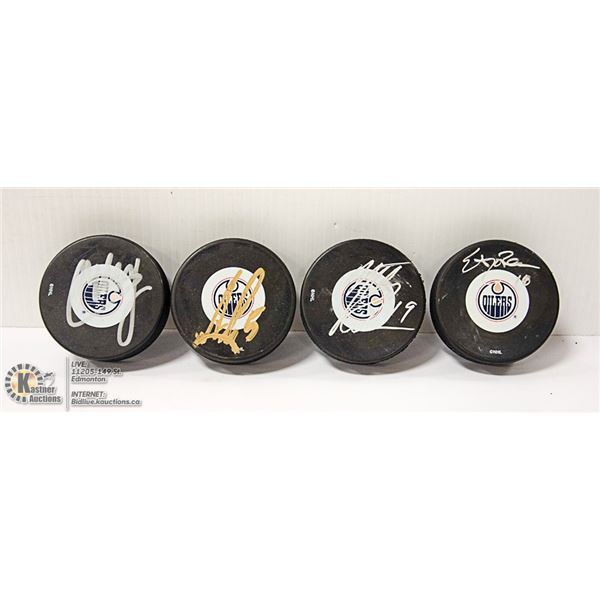 LOT OF 4 EDMONTON OILERS SIGNED HOCKEY PUCKS