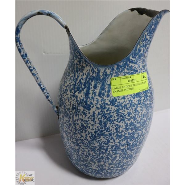 LARGE ANTIQUE BLUE AND WHITE ENAMEL PITCHER