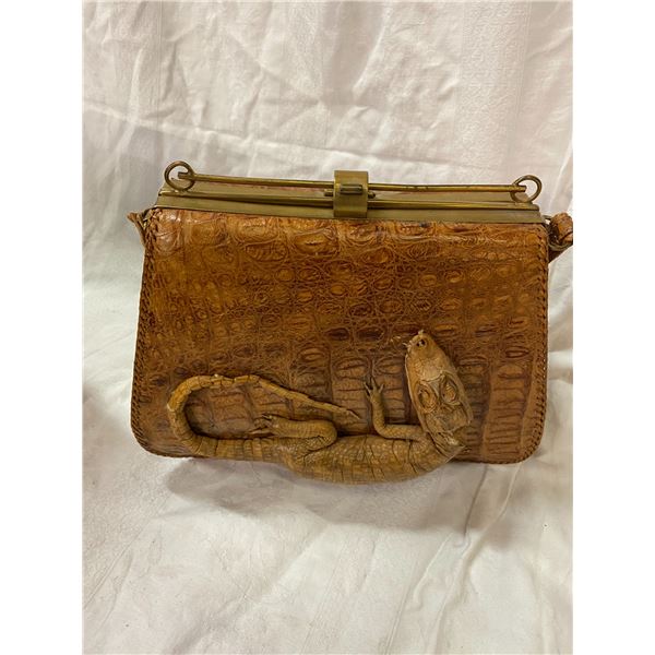 Alligator skin purse handle needs repair