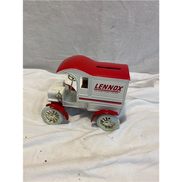 Cast iron advertising bank one wheel needs repair