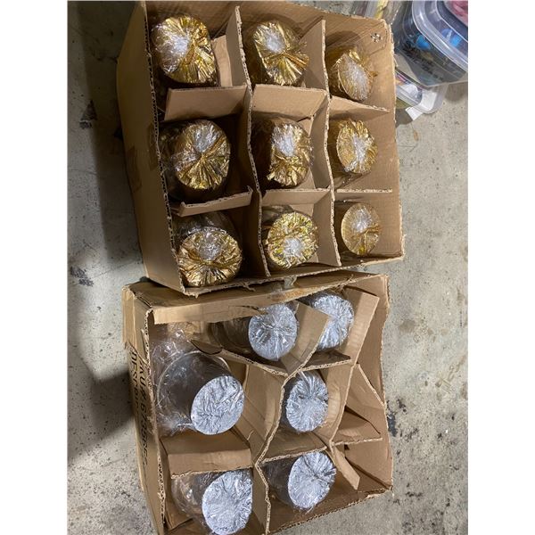 2 cases of candles some are squished a bit