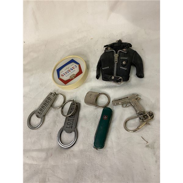 Lot bottle openers and key chains and pocket knife