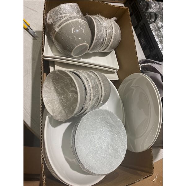 Lot white platters and grey bowls serving dishes