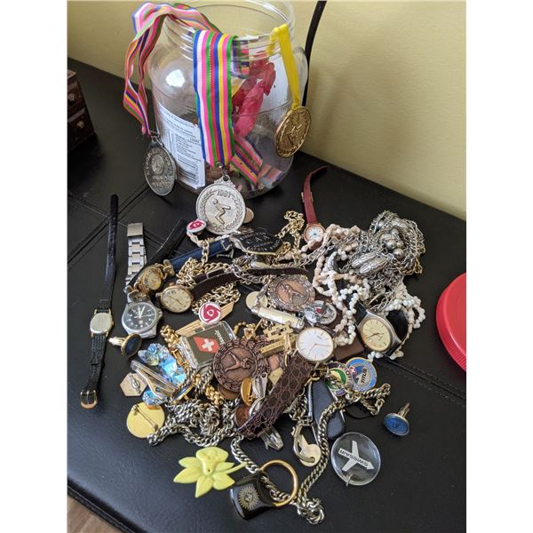 jar of treasures assorted medals, pins, jewelry