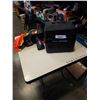 Image 1 : Simoniz polisherwith high vis vest, safety glasses and overshoes