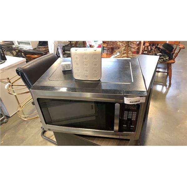 STAINLESS MICROWAVE AND BROOKSTONE RELAXING SOUND MACHINE