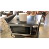 Image 1 : STAINLESS MICROWAVE AND BROOKSTONE RELAXING SOUND MACHINE