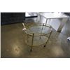 Image 1 : OVAL BRASS AND GLASS TEA TROLLEY