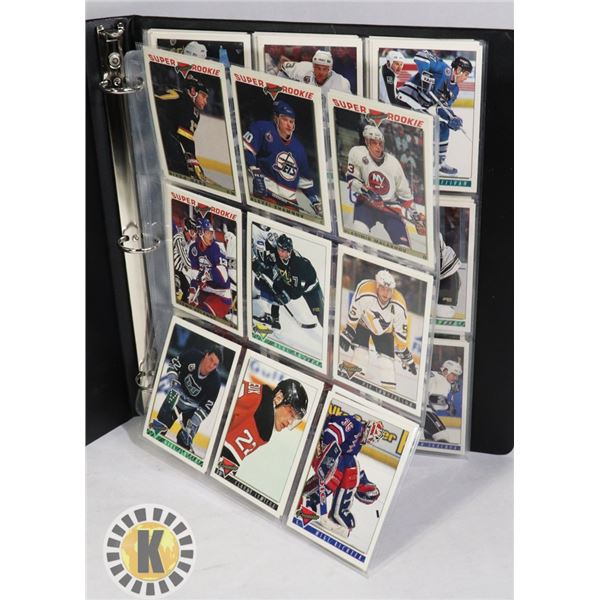 BINDER OF ASSORTED HOCKEY CARDS