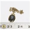 Image 1 : 940-130 GOLD TONE NECKLACE, BLACK PENDANT W/ FACE