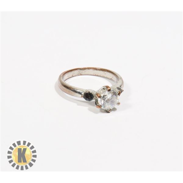 925-115 SILVER TONE BAND W/ MEDIUM CRYSTAL RING