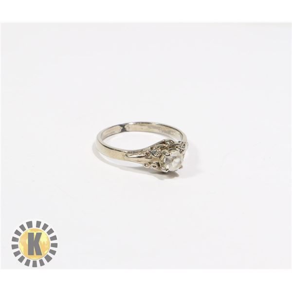 925-126 SILVER TONE W/ CENTER CRYSTAL RING