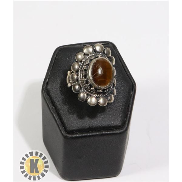 925-140 LARGE CIRCLE SHAPED WITH BROWN JEWEL