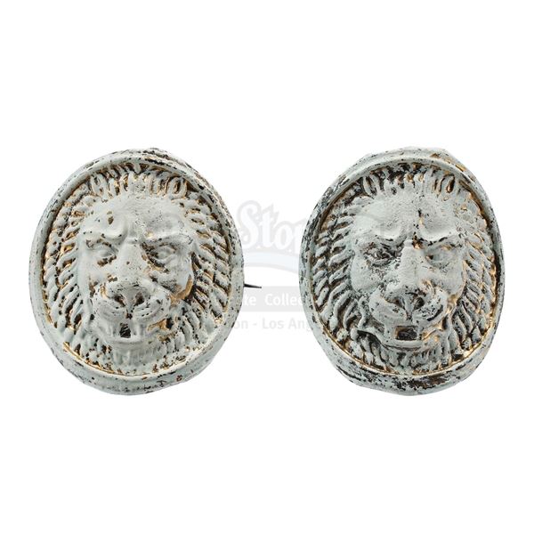 Lot # 698: GLADIATOR (2000) - Commodus' (Joaquin Phoenix) Lion Head Cape Pins Display