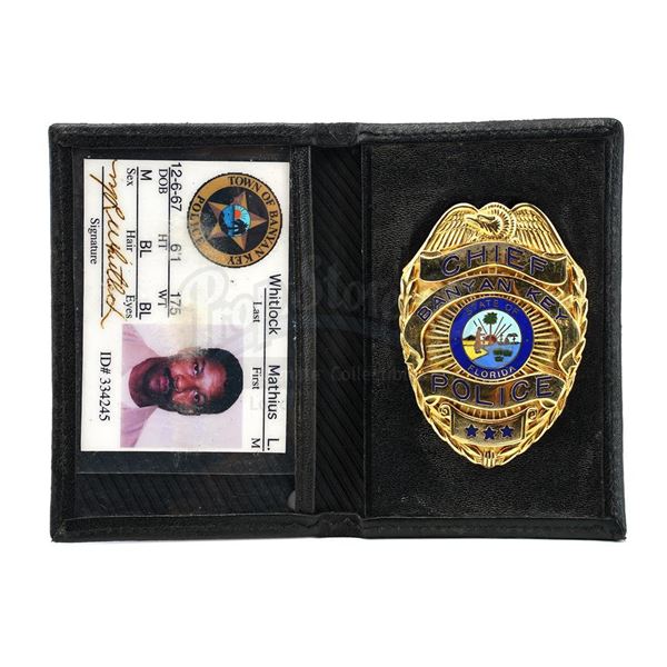 Lot # 945: OUT OF TIME (2003) - Mathius Whitlock's (Denzel Washington) Police Badge and Photo ID Wal