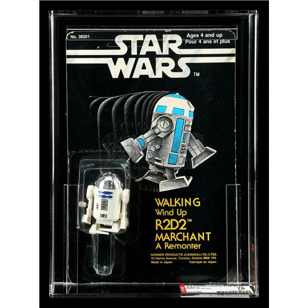 Lot # 1221: STAR WARS - EP IV - A NEW HOPE (1977) - Canadian Carded Walking Wind-Up R2-D2 SW18B AFA 