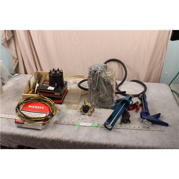 Container with chain, trailer wire, carb kit, distributor cap, misc garage items