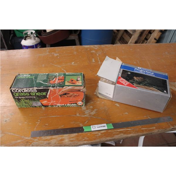 Cordless Grass Shear and Mastercraft Projector