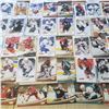 Image 4 : 100+ hockey cards, plus some empty hard sleeves. numbered jersey O'Reilly, Brashear, Byfuglen