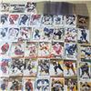 Image 7 : 100+ hockey cards, plus some empty hard sleeves. numbered jersey O'Reilly, Brashear, Byfuglen