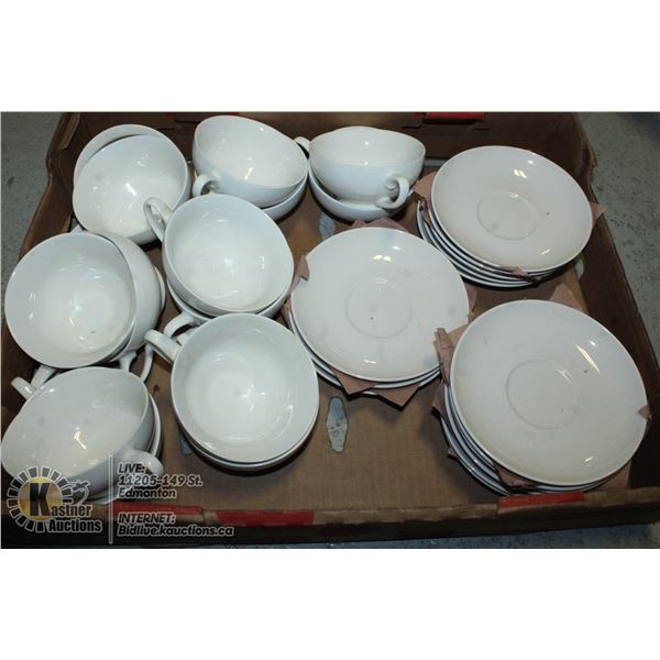 FLAT OF WHITE TEACUPS AND SAUCERS