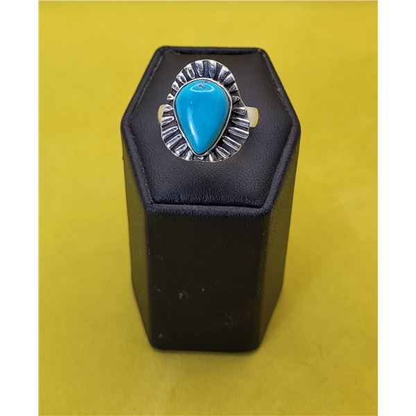 14)  TEAR DROP SHAPED TURQUOISE RING