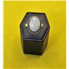 Image 1 : 28)  OVAL MOON STONE RING WITH TWISTED