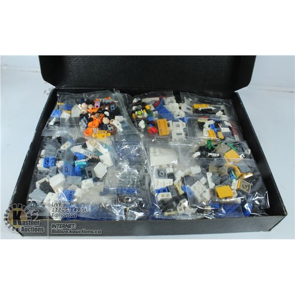 BOX OF NEW LEGO PIECES.